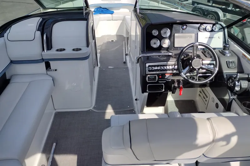 Slide: The Image of 2019 Formula 310 Bowrider interior with modern dashboard and seating. - 48