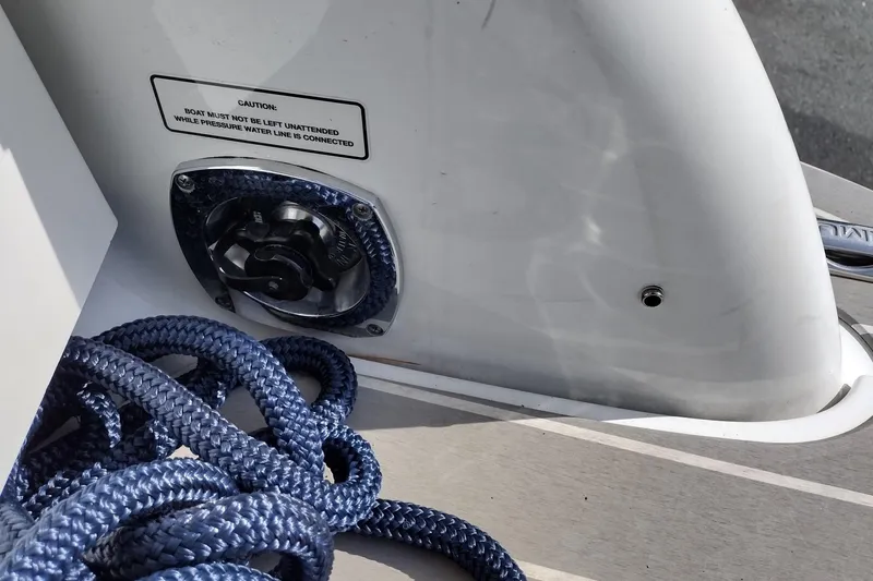 Slide: The Image of Blue rope and caution sign on 2019 Formula 310 Bowrider boat deck. - 52