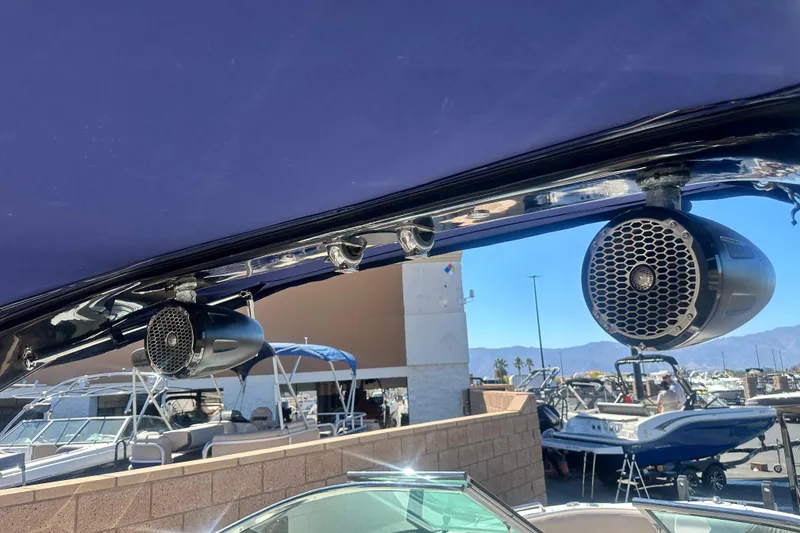 Slide: The Image of Engine compartment of a 2012 Regal 24 FasDeck boat, featuring a V8 engine. - 25