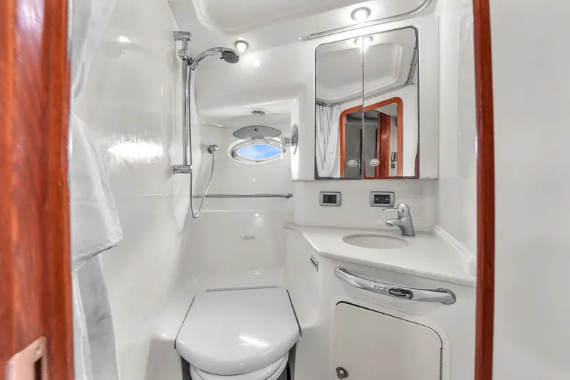 Slide: The Image of Luxurious bathroom in 2004 Sea Ray 460 Sundancer yacht with shower and vanity. - 29