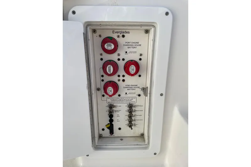 Slide: The Image of Control panel of a 2008 Everglades 290 Center Console boat with battery switches. - 11