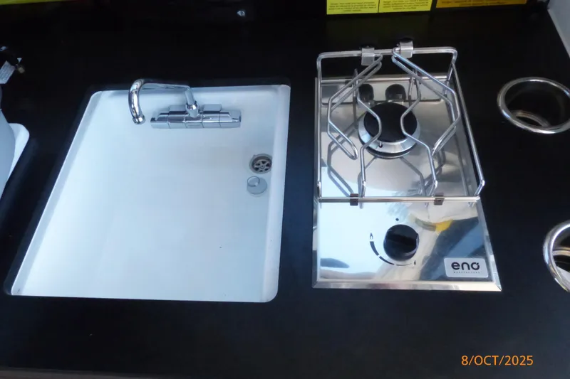 Slide: The Image of Interior of 2023 Jeanneau NC Weekender 795 Series 2 with table and seating. - 7