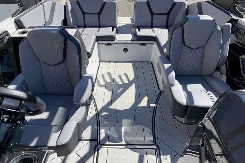 Slide: The Image of 2025 Yamaha Boats 255XD interior with modern seating and sleek design. - 12