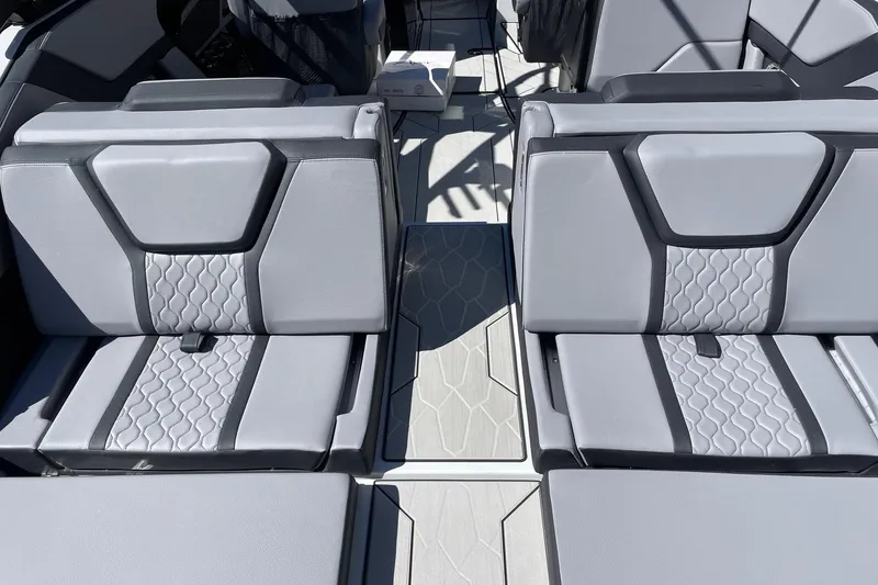Slide: The Image of 2025 Yamaha Boats 255XD interior seating with modern gray upholstery and stylish design. - 4
