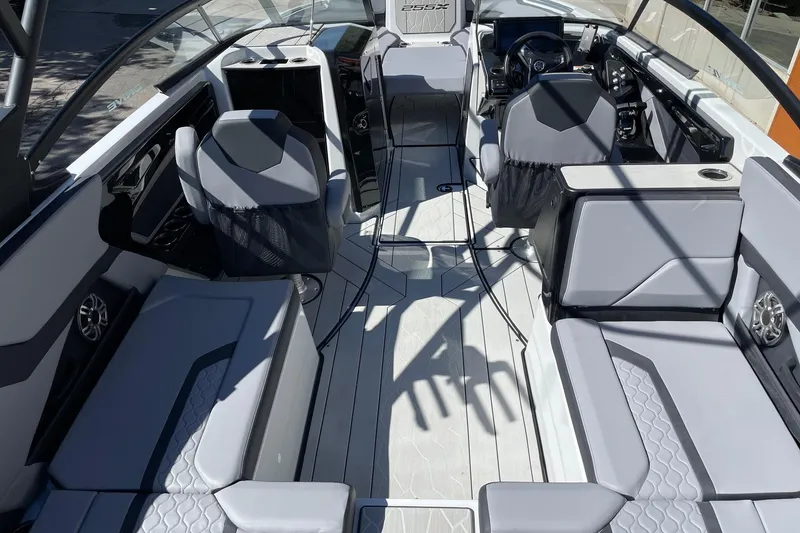 Slide: The Image of 2025 Yamaha Boats 255XD interior with modern seating and sleek design. - 5