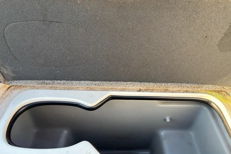 Slide: The Image of 2016 Nitro Z18 boat with Mercury Pro XS engine on trailer, parked outdoors. - 14