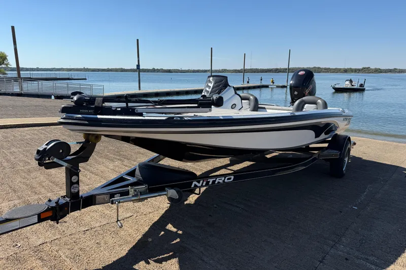 Slide: The Image of Open storage compartment in a 2016 Nitro Z18 boat. - 32