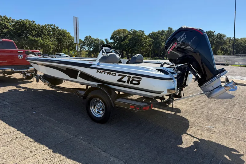 Slide: The Image of Garmin echoMAP DV on 2016 Nitro Z18 boat dashboard, featuring navigation controls. - 37