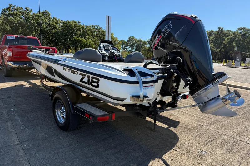 Slide: The Image of Close-up of a Nitro Z18 boat motor, 2016 model, in a sunny outdoor setting. - 38