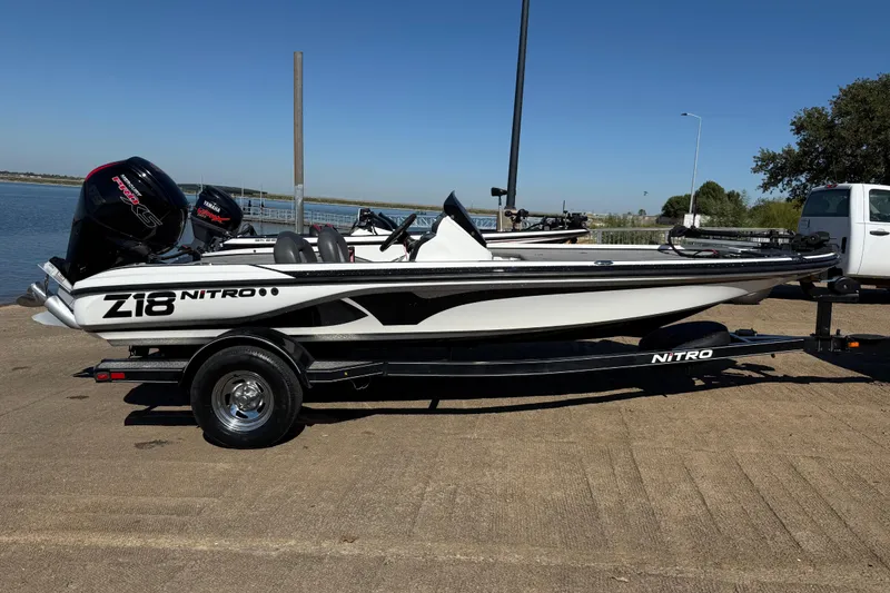 Slide: The Image of Control panel of a 2016 Nitro Z18 boat with dual switches. - 45