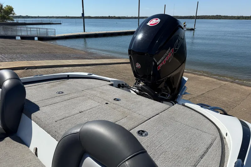 Slide: The Image of Storage compartment of 2016 Nitro Z18 Pro boat with fire extinguisher. - 54