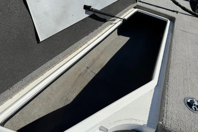 Slide: The Image of Open storage compartment in 2016 Nitro Z18 Pro boat. - 55