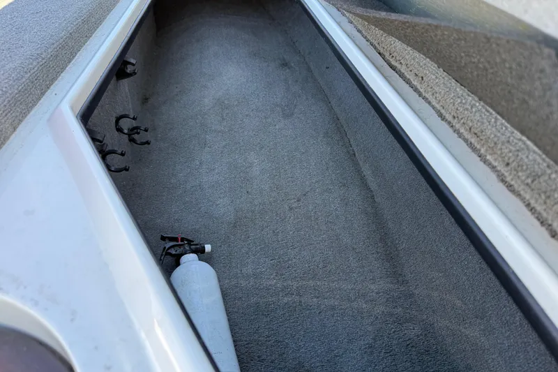 Slide: The Image of Gray and black seat on a 2016 Nitro Z18 Pro boat deck. - 57