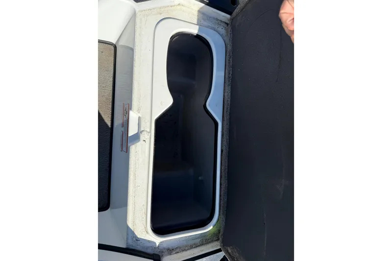 Slide: The Image of 2016 Nitro Z18 Pro boat interior with gray seating and steering wheel. - 58