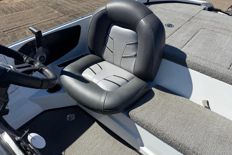 Slide: The Image of Battery compartment of a 2016 Nitro Z18 Pro boat with wiring and components. - 61