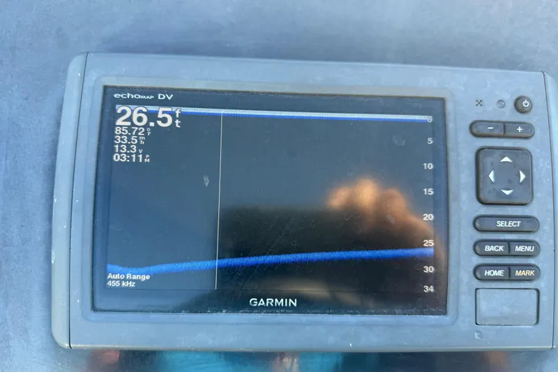 Slide: The Image of Close-up of a 2016 Nitro Z18 Pro boat propeller, showcasing its shiny metallic finish. - 69