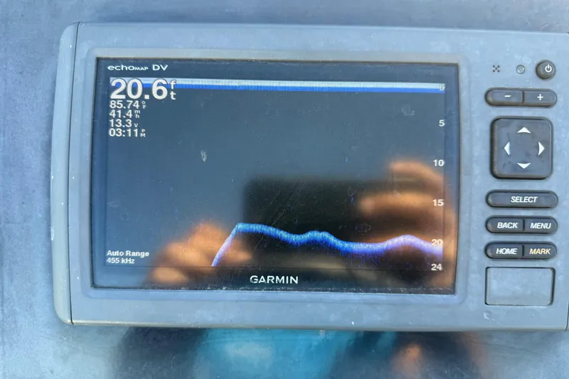 Slide: The Image of Close-up of a 2016 Nitro Z18 Pro boat propeller on a concrete floor. - 70