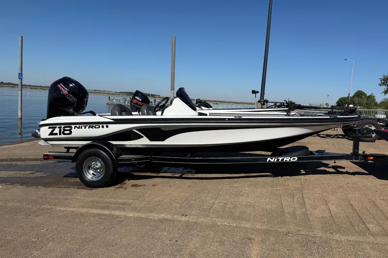 Slide: The Image of Boat trailer partially submerged at a boat ramp, Nitro Z18 Pro, 2016 model. - 73