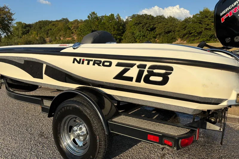 Slide: The Image of 2016 Nitro Z18 Pro boat on trailer, parked outdoors. - 8
