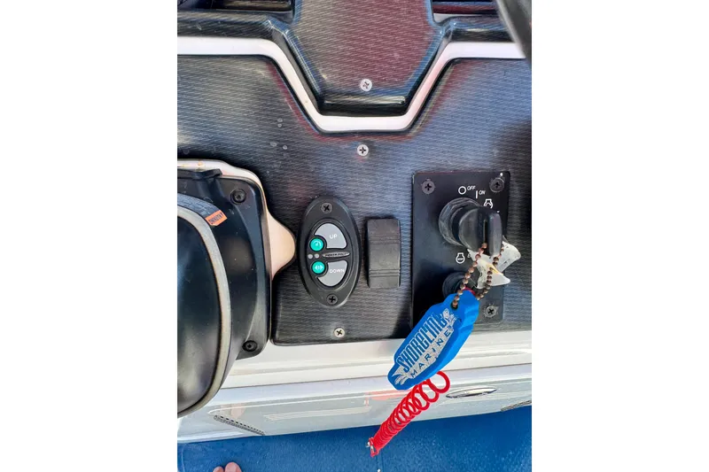 Slide: The Image of Control panel of 2016 Blue Wave 2200 STL RISER boat with ignition and switches. - 13