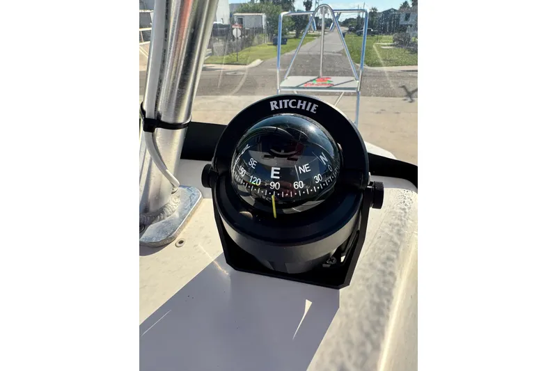 Slide: The Image of Compass on 2016 Blue Wave 2200 STL RISER boat, showing east direction. - 14