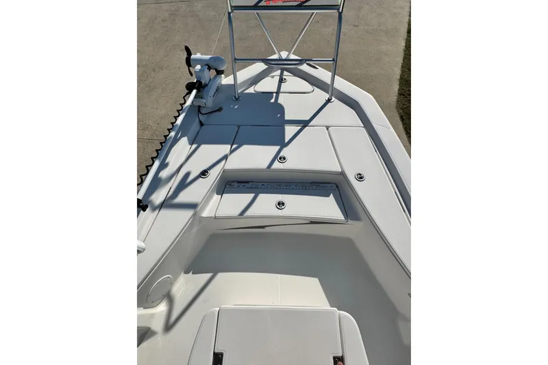 Slide: The Image of 2016 Blue Wave 2200 STL RISER boat deck with seating and storage compartments. - 18