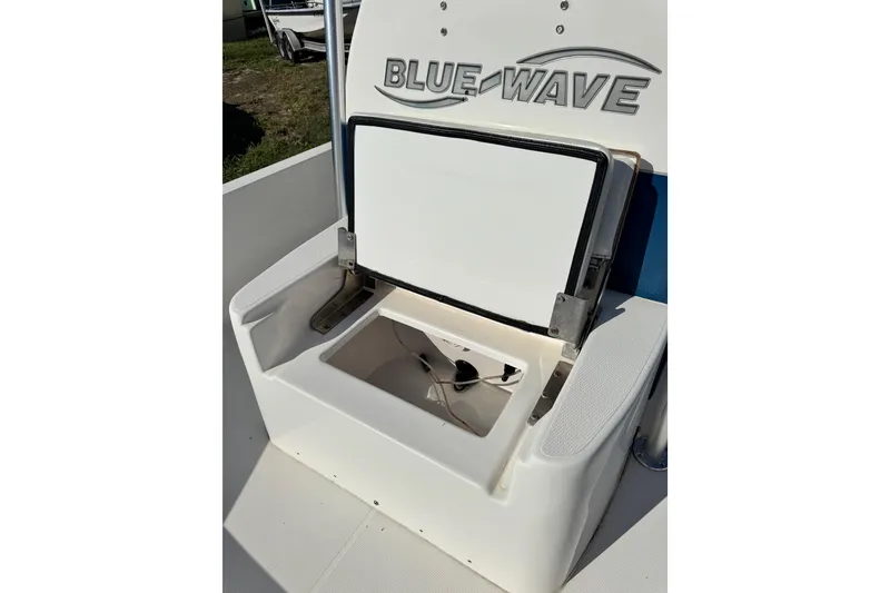 Slide: The Image of 2016 Blue Wave 2200 STL RISER boat seat with open storage compartment. - 25