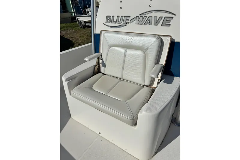 Slide: The Image of 2016 Blue Wave 2200 STL RISER boat seat with armrests and logo. - 26
