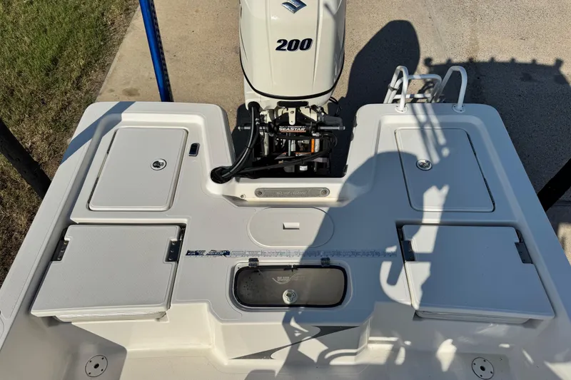 Slide: The Image of 2016 Blue Wave 2200 STL RISER boat with Suzuki 200 engine, rear deck view. - 34