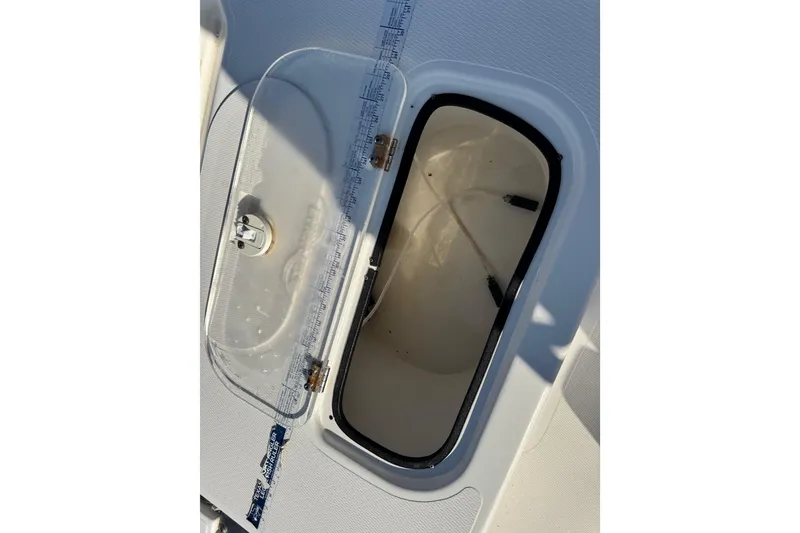 Slide: The Image of Open storage compartment on 2016 Blue Wave 2200 STL RISER boat. - 41