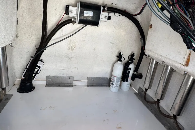 Slide: The Image of 2016 Blue Wave 2200 STL RISER boat interior wiring and fire extinguishers. - 43