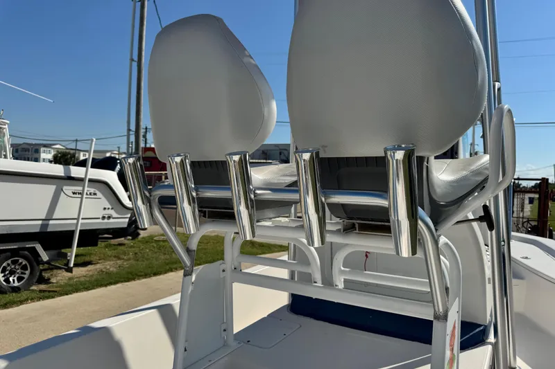 Slide: The Image of 2016 Blue Wave 2200 STL RISER boat with dual seats and rod holders. - 45