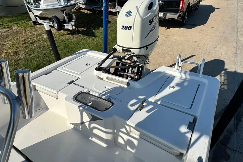 Slide: The Image of 2016 Blue Wave 2200 STL RISER boat with Suzuki 200 outboard motor. - 53