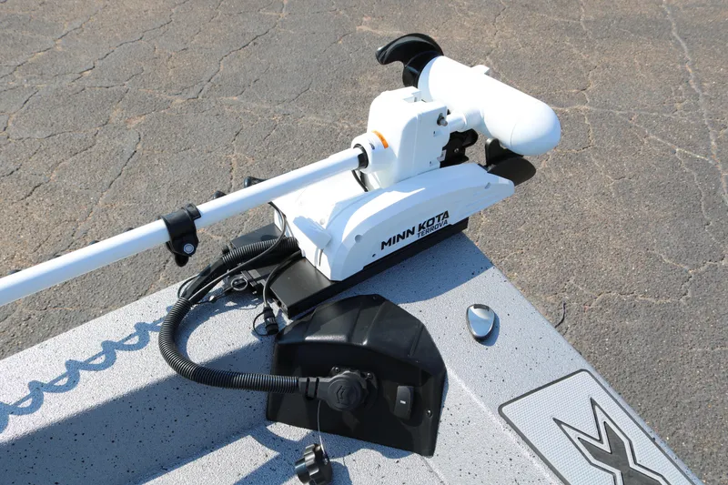 Slide: The Image of 2026 Xpress H20B Bay boat deck with storage compartments and seating. - 17