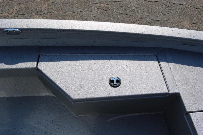 Slide: The Image of 2026 Xpress H20B Bay boat with open storage compartment and tackle box. - 20