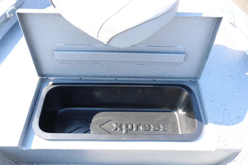 Slide: The Image of 2026 Xpress H20B Bay boat interior with seating and storage compartment. - 23