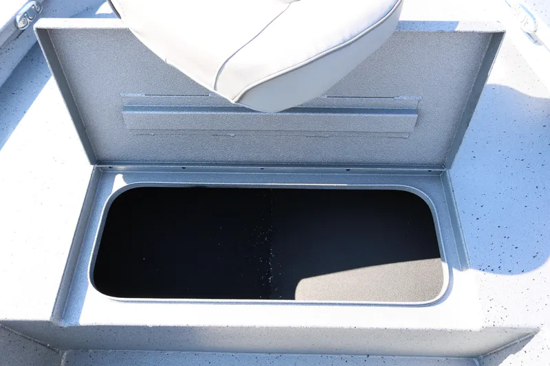 Slide: The Image of 2026 Xpress H20B Bay boat seating with black upholstery and diamond stitching. - 24