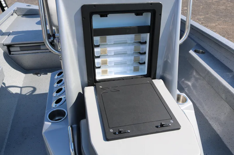 Slide: The Image of 2026 Xpress H20B Bay boat interior with steering wheel and seating. - 26