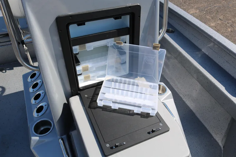 Slide: The Image of 2026 Xpress H20B Bay boat interior with steering wheel and seating detail. - 27