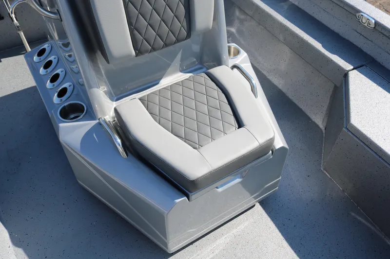 Slide: The Image of 2026 Xpress H20B Bay boat interior with seating and storage compartments. - 28