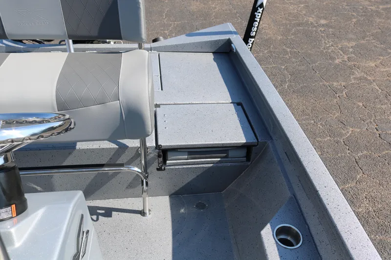 Slide: The Image of 2026 Xpress H20B Bay boat console with steering wheel and controls. - 33