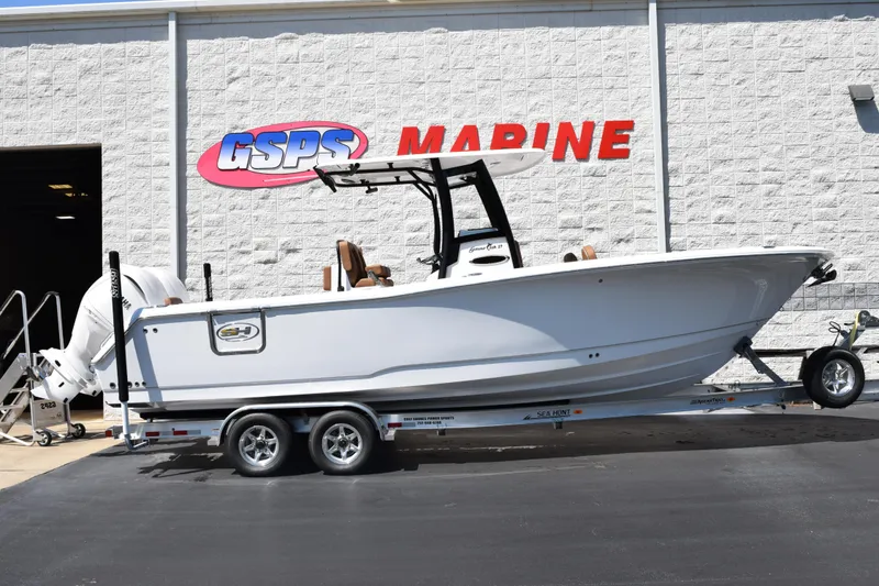 The Image of 2026 Sea Hunt Gamefish 27 boat on trailer at GSPS Marine dealership. - 1