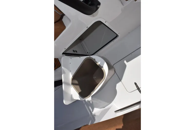 Slide: The Image of Open storage compartment on 2026 Sea Hunt Gamefish 27 Forward Seating boat. - 22
