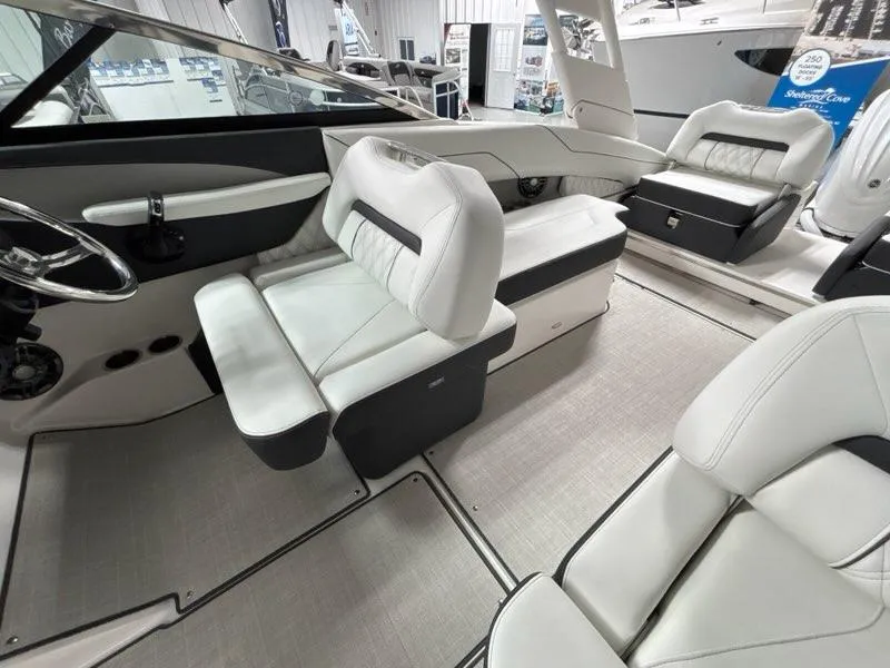 Slide: The Image of 2026 Regal LX4 boat interior with luxurious white seating and modern design. - 10