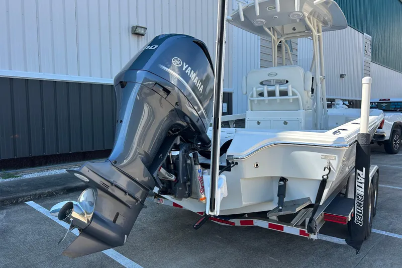 Slide: The Image of 2019 Pathfinder 2600 HPS boat with Yamaha outboard motor on trailer. - 14