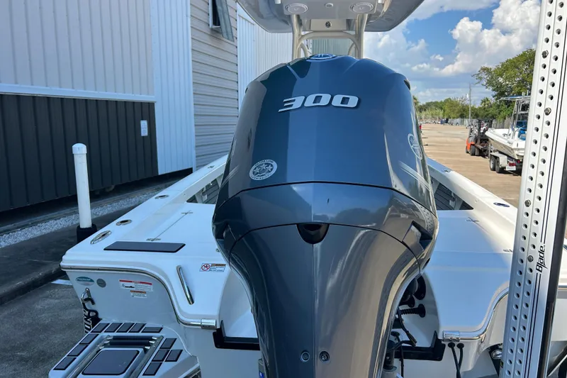 Slide: The Image of 2019 Pathfinder 2600 HPS boat with a 300 horsepower engine, docked outdoors. - 15