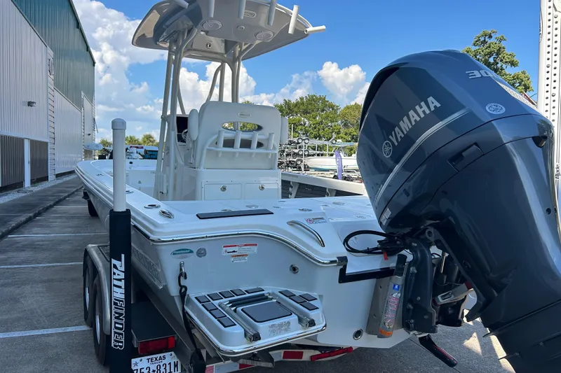 Slide: The Image of 2019 Pathfinder 2600 HPS boat with Yamaha engine on trailer. - 16