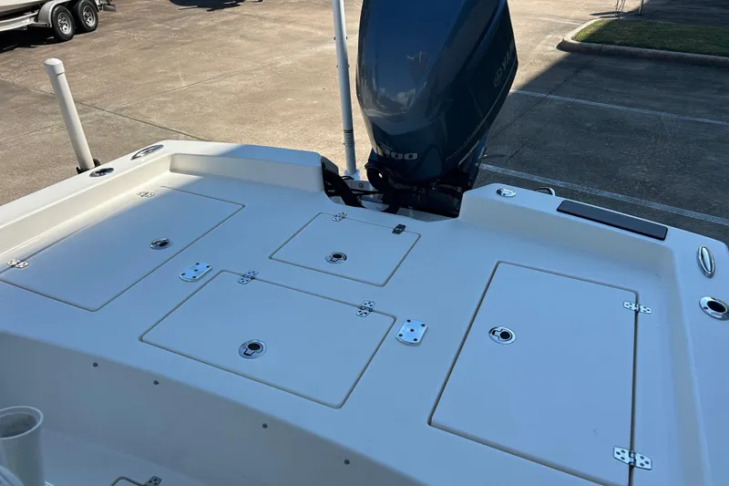 Slide: The Image of 2019 Pathfinder 2600 HPS boat with Yamaha outboard engine, docked on concrete surface. - 18