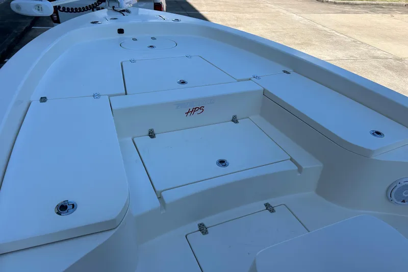 Slide: The Image of 2019 Pathfinder 2600 HPS boat deck with storage compartments and clean design. - 28