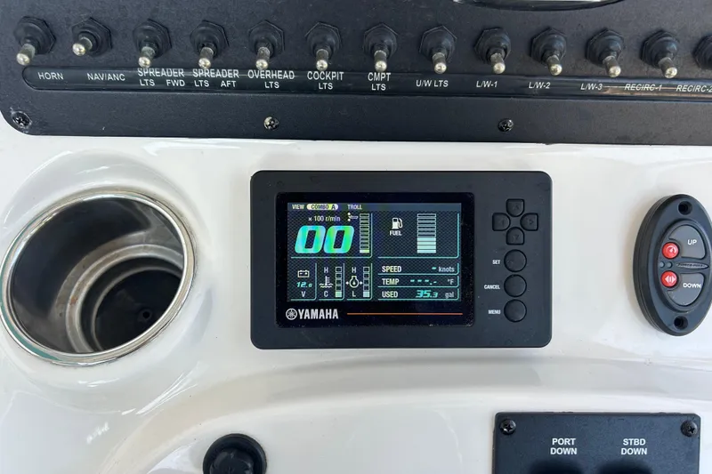 Slide: The Image of Control panel of a 2019 Pathfinder 2600 HPS boat with Yamaha display and switches. - 39